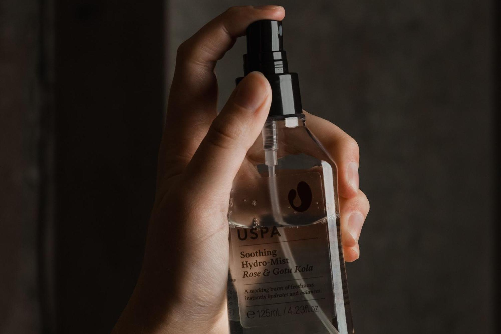 Peppers Silo Hotel Launceston Buitenkant foto A woman using a facial mist